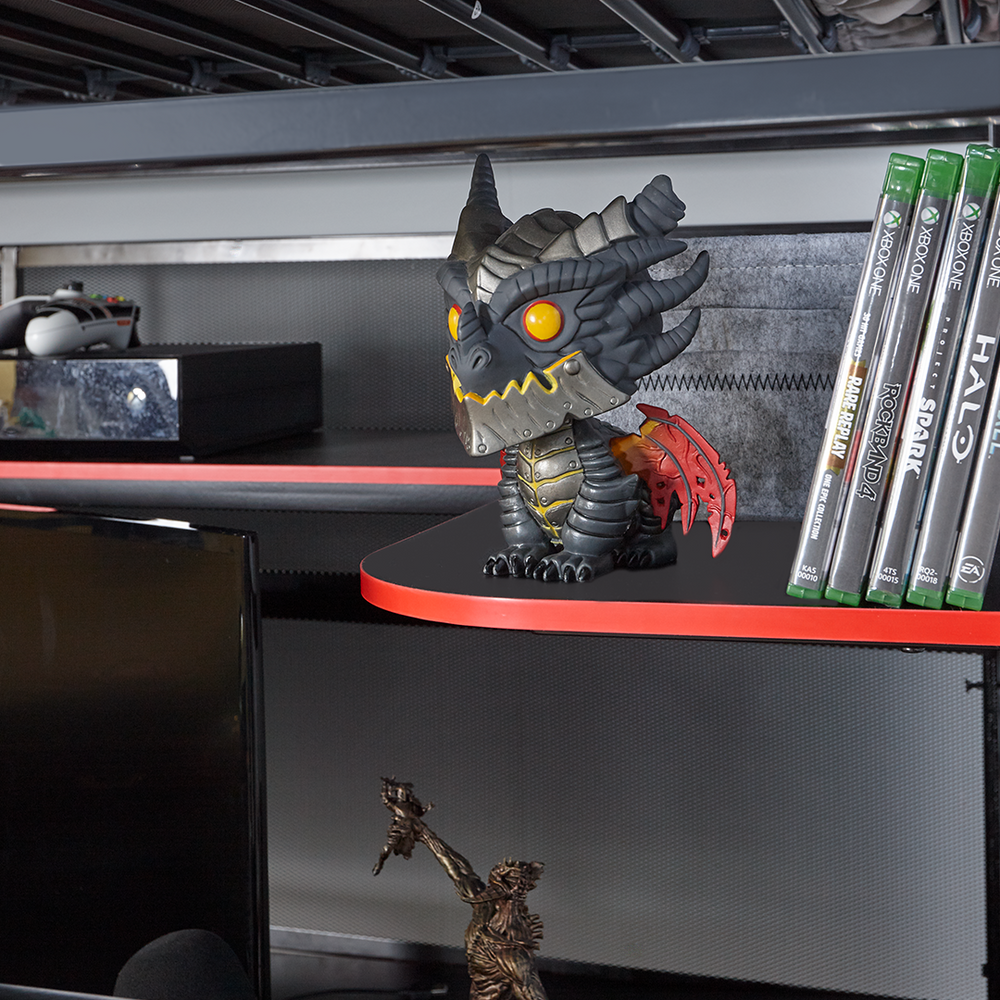 close up image of the storage shelves with action figure ornament and xbox games